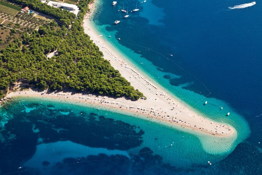 3 Islands Speedboat Tour: Golden Horn, Blue Lagoon & Jelsa - Zlatni Rat on Brač is famous, photogenic, and crowded