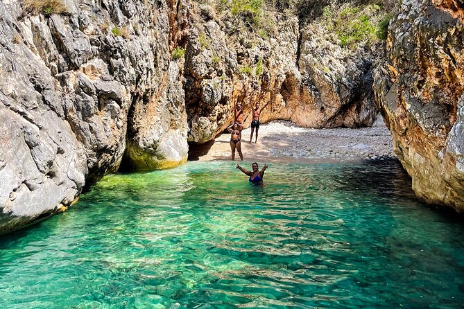 Blue Cave & Grama Bay Full Day Guided Boat Tour - Llovizi Beach and Blue Cave