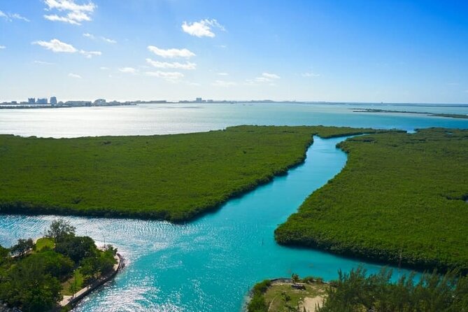 Cancun Jungle Tour with Speedboat and Snorkeling - Learning to handle the boat