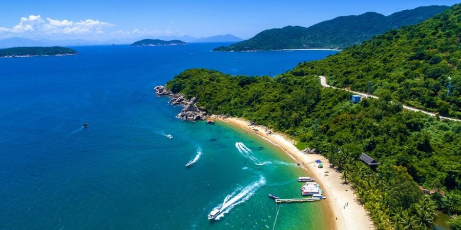 Da Nang/Hoi An: Cham Island Speedboat Tour with Snorkeling - Lang Beach, island life, and the ancient well