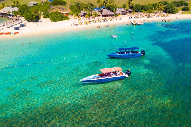 Discovery Powerboat Tour ,Snorkeling with Turtles & BBQ Lunch - A full day across two sides of the island