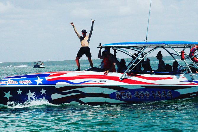 Dolphin-Watching Speedboat Cruise in Destin Harbor - A speedboat ride with music and jokes