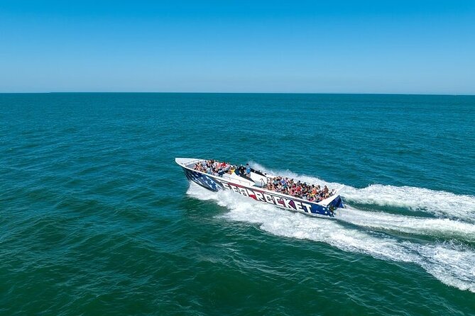 EARLY BIRD SPECIAL: Speed Boat & Dolphin Cruise in Ocean City, MD - Cruising beside Ocean City beach