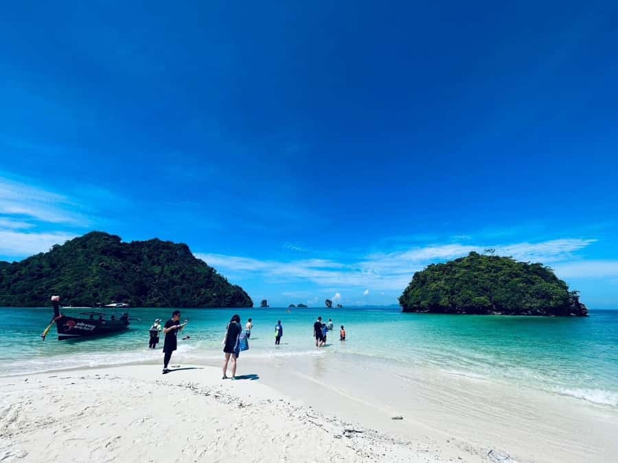 From Krabi: Phi Phi Early Bird & 4 Islands by Speedboat - The first sandbar stop around Tup and Mor