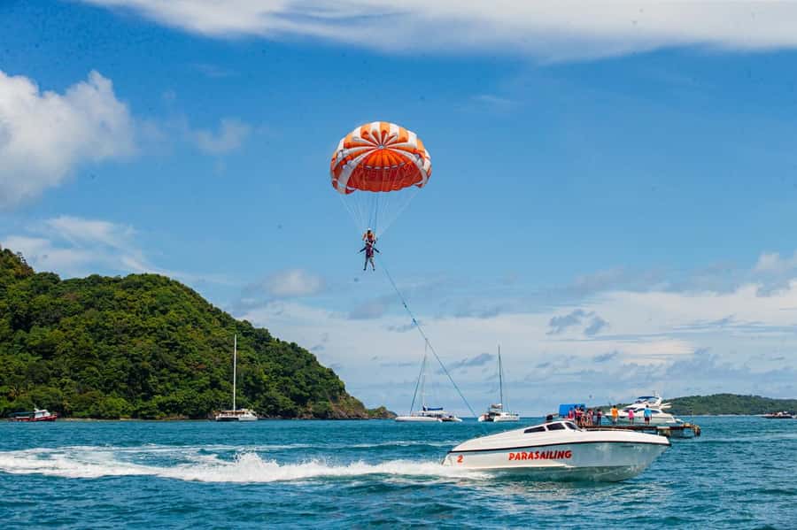 From Phuket: Coral Island Kahung Beach Speedboat Trip - From your Phuket hotel to Chalong Pier