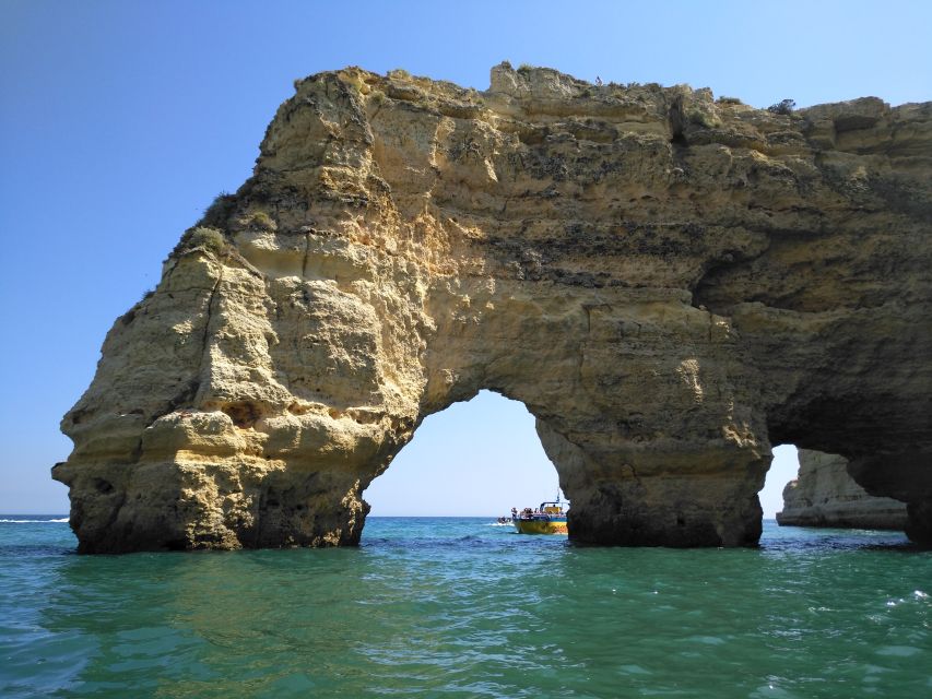 From Portimão: Benagil Caves Guided Speedboat Tour - Entering Benagil Cave by boat