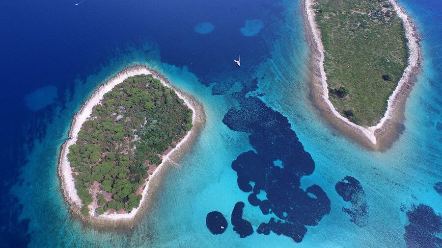 From Split: Blue Lagoon and Trogir Half-Day Speedboat Tour - The Blue Lagoon and its clear, shallow water