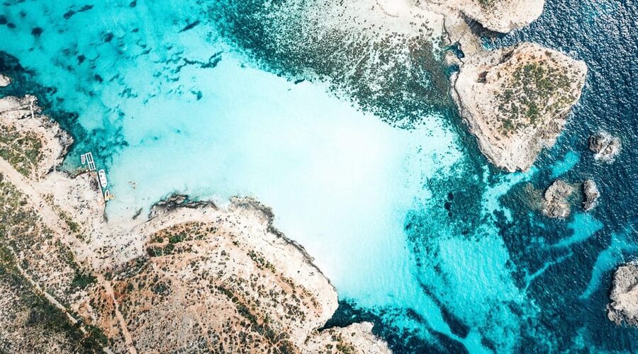 From St. Julian's: Gozo, Comino, Blue Lagoon by Powerboat - The Blue Lagoon is beautiful, but rarely quiet