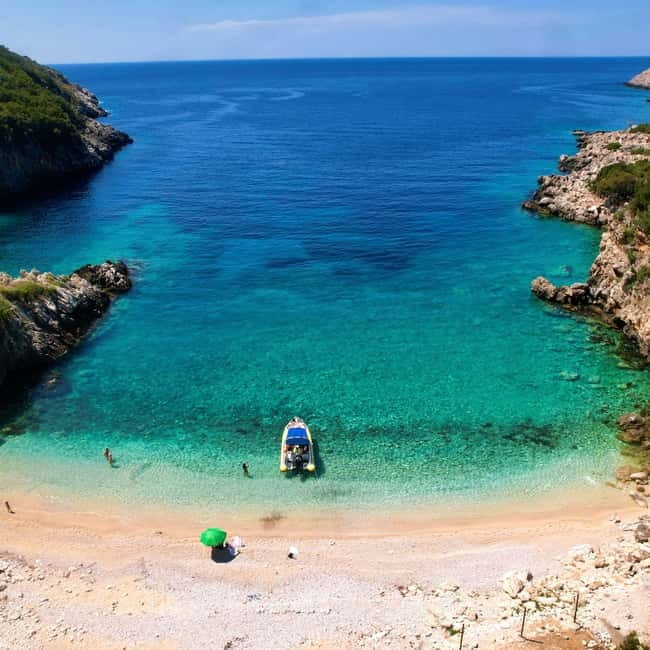 From Vlore: Haxhi Ali Cave & Karaburun Beach Speedboat Tour - St. Vasil Beach gives you room to slow down