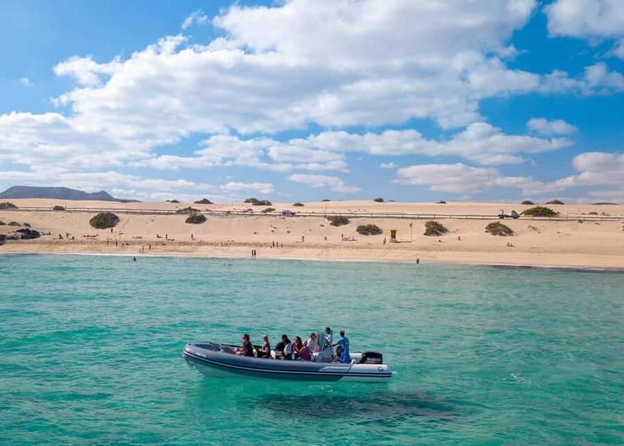 Fuerteventura: Lobos Island Round-Trip Speedboat Ticket - Walking across Lobos, from volcanic slopes to the lighthouse