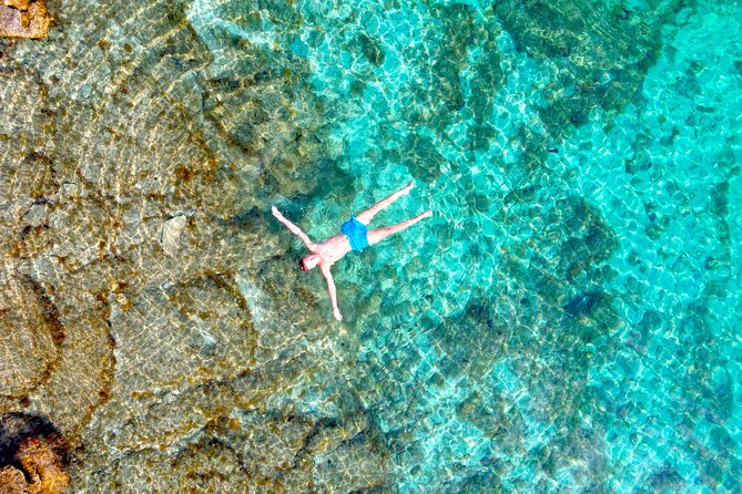 Half-day Speedboat Tour: Explore Hidden Gems of Hvar Island - Captains, group atmosphere, and service