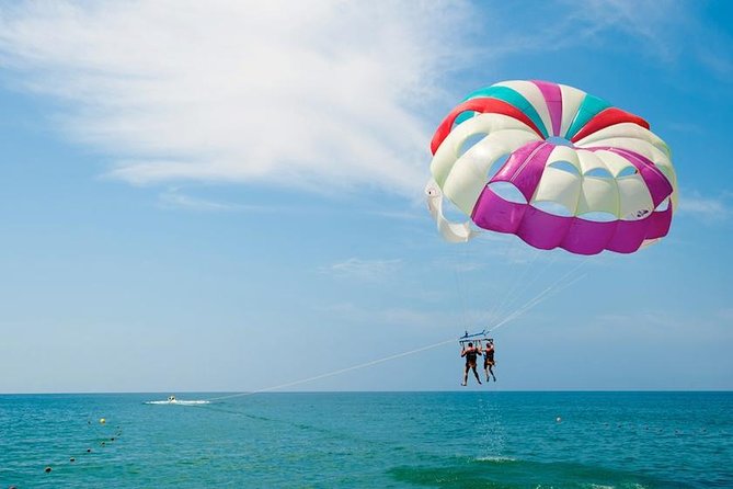 Ile aux Cerf: Speed boat with Parasailing & Tube Riding and Lunch - Parasailing over Mauritius