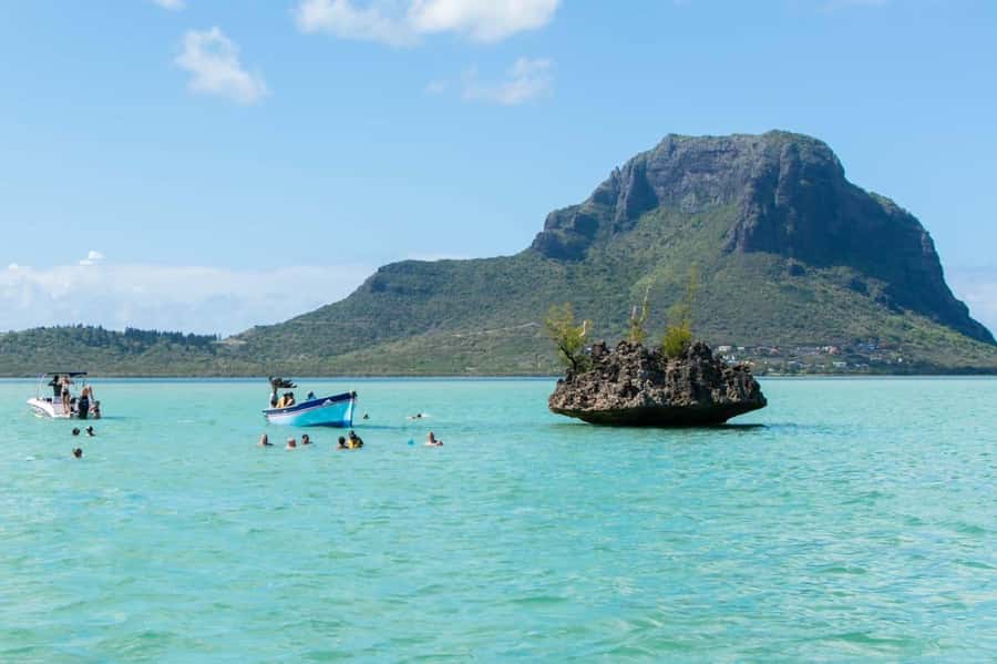 La Preneuse: Dolphin Watching and Snorkeling Speedboat Tour - The lagoon snorkeling stop