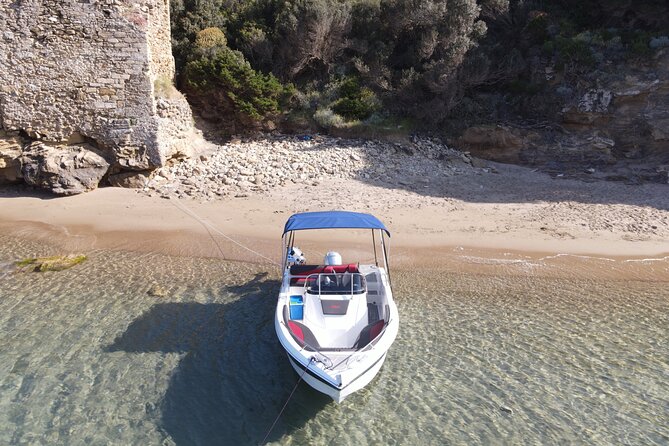 Luxury Speedboat Cruise to Shipwreck and Blue Caves - Pelagaki Beach and caves along the shore