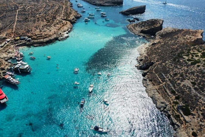 Mellieha: 1:00pm Speedboat round Comino Caves 2h Blue Lagoon - Walking to St. Marija Tower