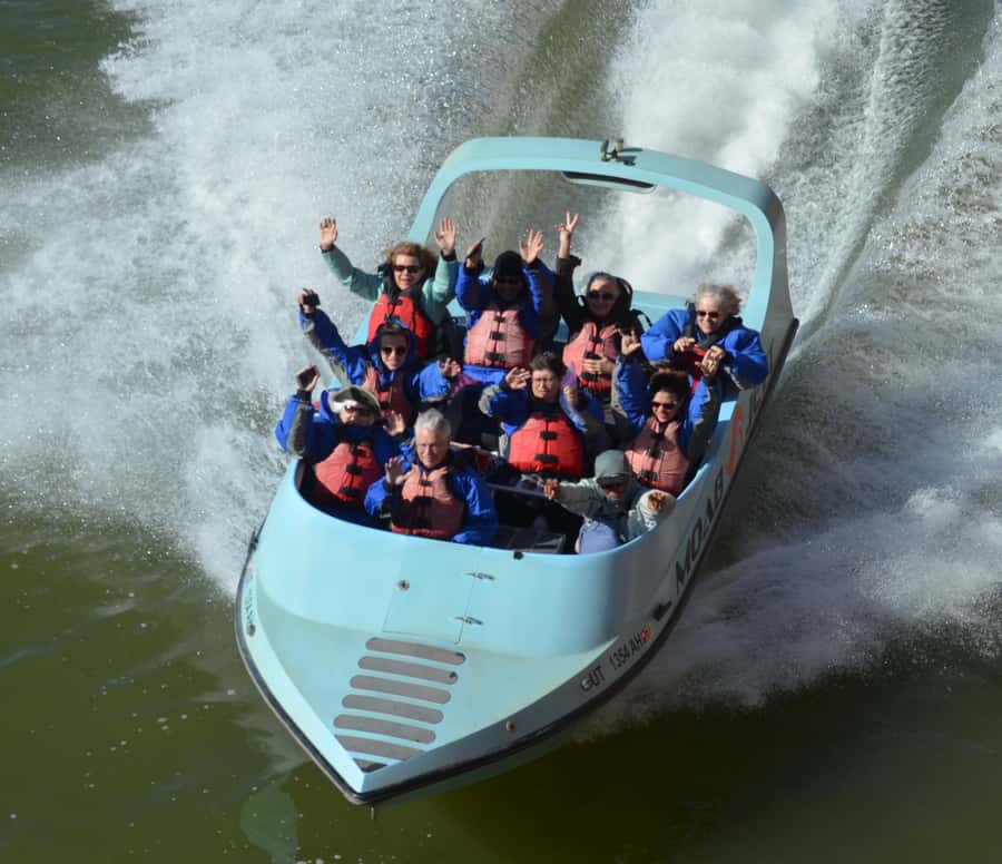 Moab: 2-Hour New Zealand style Adventure Jet Boat Tour - Leaving downtown Moab for the river