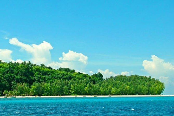 Phi Phi & Bamboo Islands Full-Day Tour by Speedboat From Phuket - Ton Sai Pier turns lunch into a real island stop