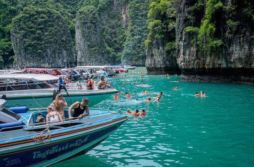 Phi Phi: Early Morning Speed Boat to Maya Bay - Maya Bay: 80 minutes beneath the cliffs