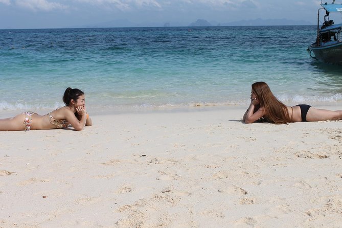 Phi Phi Islands Day Tour Bamboo and Maya Bay with Lunch By Speedboat - Maya Bay: famous water and a busy shore