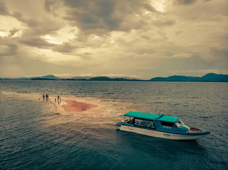 Phuket: Phi Phi Island Sunrise Group Speedboat Tour - Pileh Lagoon gives you the classic Phi Phi swim