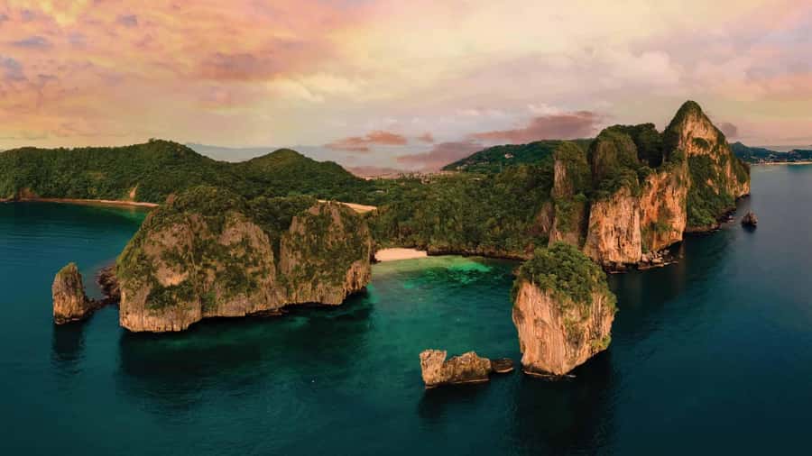 Phuket: Phi Phi Island Sunrise Group Speedboat Tour - Maya Bay: beautiful, protected, and carefully managed