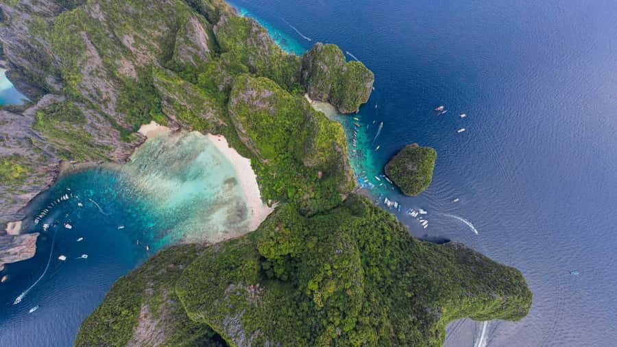 Phuket: Phi Phi Khai or Maiton Island by Speedboat/Catamaran - Khai Island: classic beach time with a busy edge
