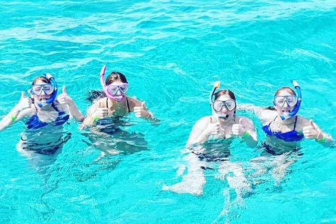 Powerboat and Snorkel Experience with Swimming Pigs and Turtles - The Crew, Music, and Small-Boat Atmosphere