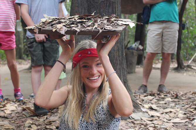 Premium Cu Chi Tunnels Tour with Local Expert by SpeedBoat - Crawling through the restored tunnels