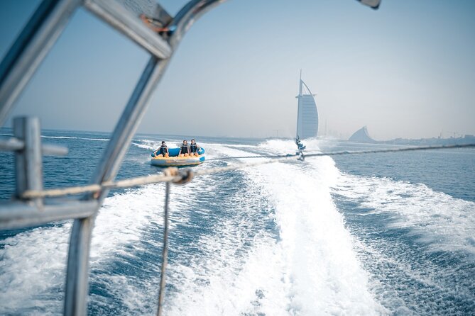Private 60-min Group Tubing on Speedboat in Dubai - Taking turns on the tube
