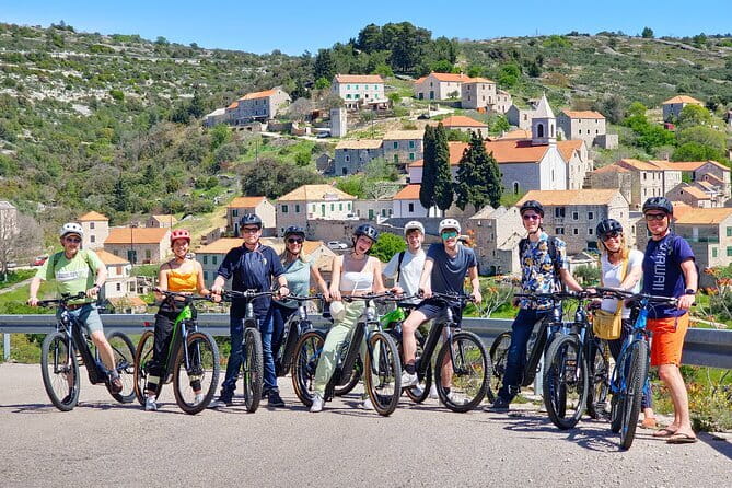 Private Custom Island Hopping Speedboat Tour from Hvar - Stiniva Cove: cliffs, clear water, and a narrow entrance