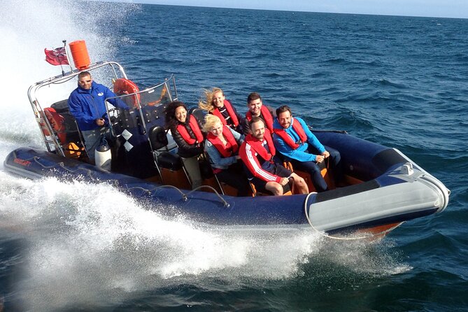 Private One Hour Powerboat trip with lots of high speed fun - Leaving Moll de la Barceloneta and Port Vell