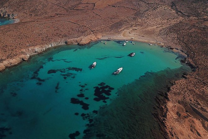 Private Speedboat Cruise from Delos to Rhenia and Mykonos - Drinks, snacks, and the practical meaning of open bar