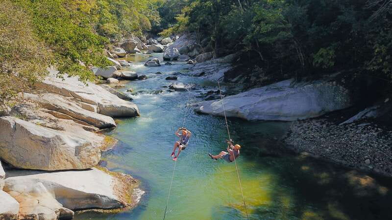 Puerto Vallarta: Canopy Tour with Zipline and Speedboat Ride - River pools, slides, and a place to cool off