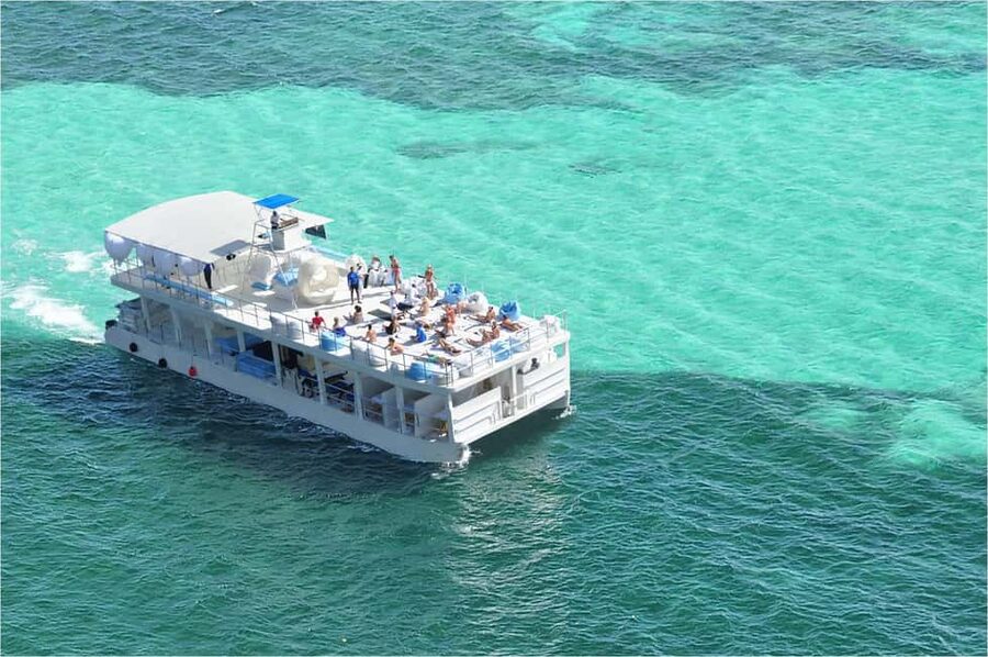 Sailing Splash Tour Speedboat, Snorkel, and Catamaran - Taking the wheel of a two-person speedboat