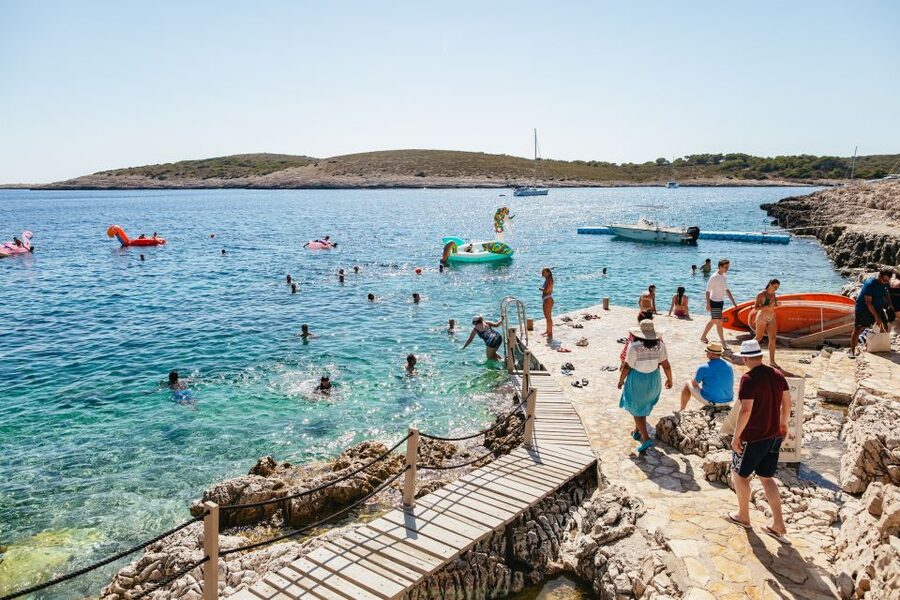 Split: Blue Cave, Vis & Hvar Full-Day Trip by Speedboat - Stiniva Cove: cliffs, clear water, and a short visit