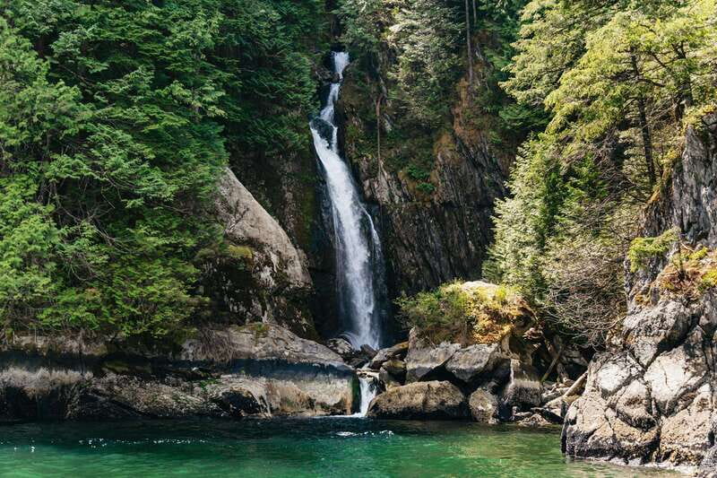 Vancouver: Indian Arm and Granite Falls Zodiac Boat Tour - English Bay, beaches, and the seawall