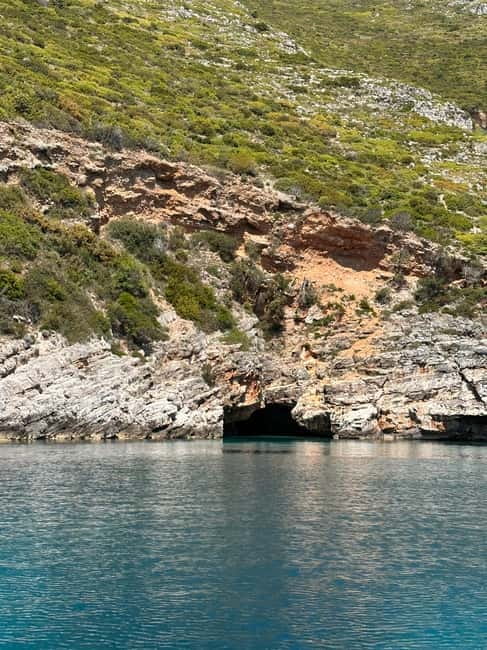 Vlora: Grama Bay and Blue Cave Speedboat Tour Adventure - Dafina Bay: the main beach stop