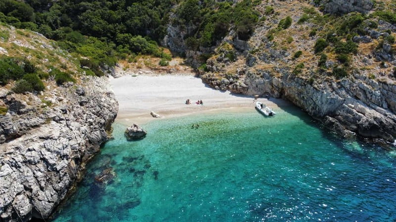 Vlore: Haxhi Ali Cave and Dafina Cave Speedboat Tour - Brsitan Bay pairs swimming with recent history