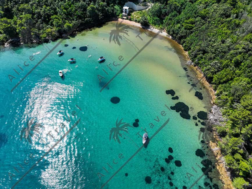 Zadar: 3 Island Speedboat Tour with Wine and Snorkeling - Kostanj: a 40-minute swim in clear water